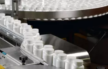 INTEGRATED PACKAGING LINE FOR BOTTLE FILLING